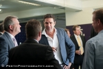Gary Lyon chatting to invited guests at NAB AFL Insider Luncheon at Patersons Stadium, 22 May 2012. Photo by Julius Pang, PerthPhotography.com.